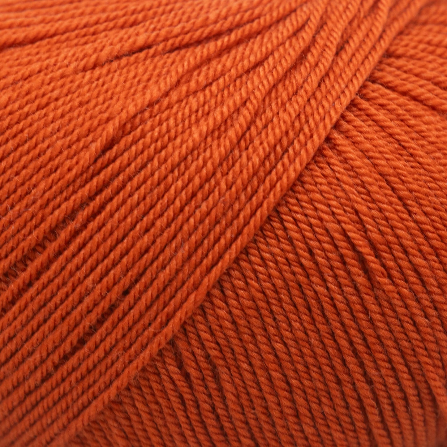 Perlina ullgarn från Filatura Cervinia i färgen mörk orange